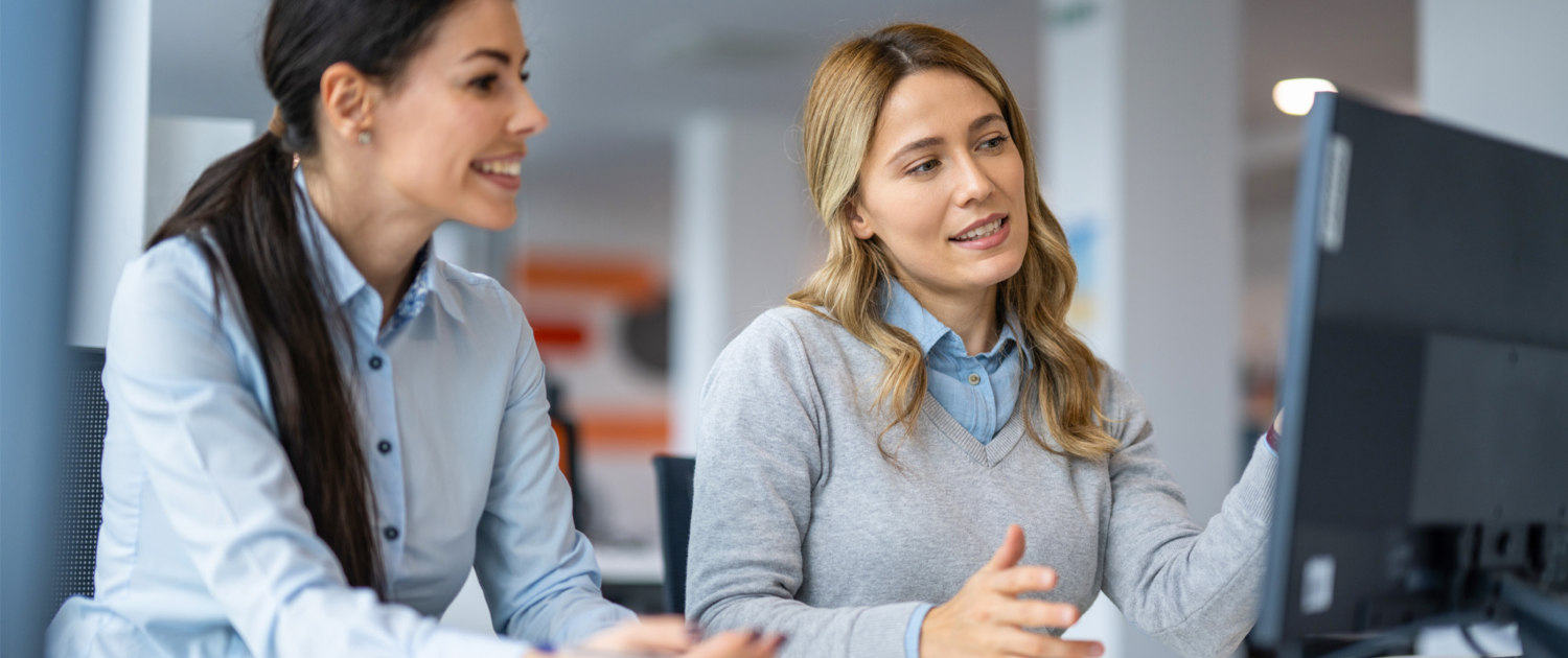 Businesswomen On Laptop