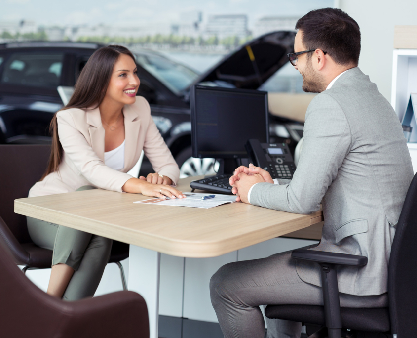 Woman In Meetign With Insurance Worker Discussing Insurance Claim
