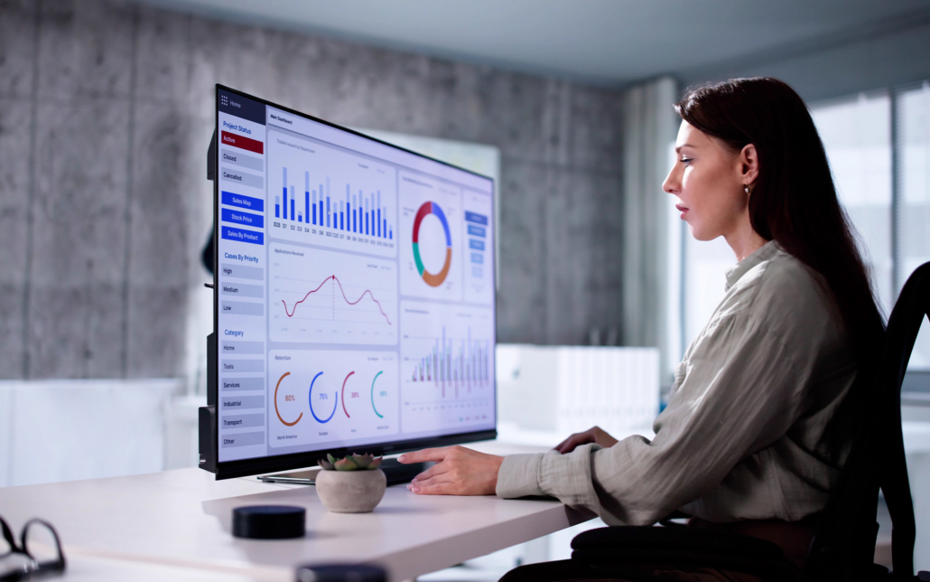 Worker Looks At Charts