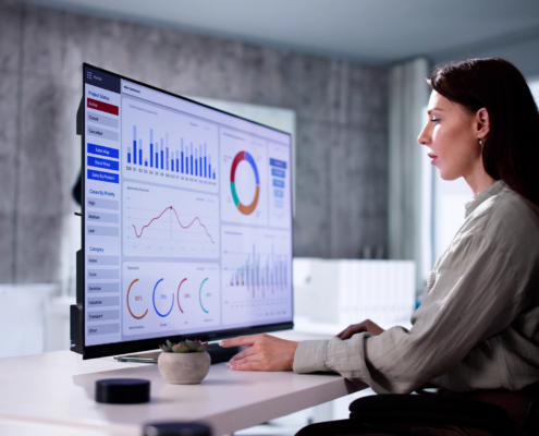 Worker Looks At Charts