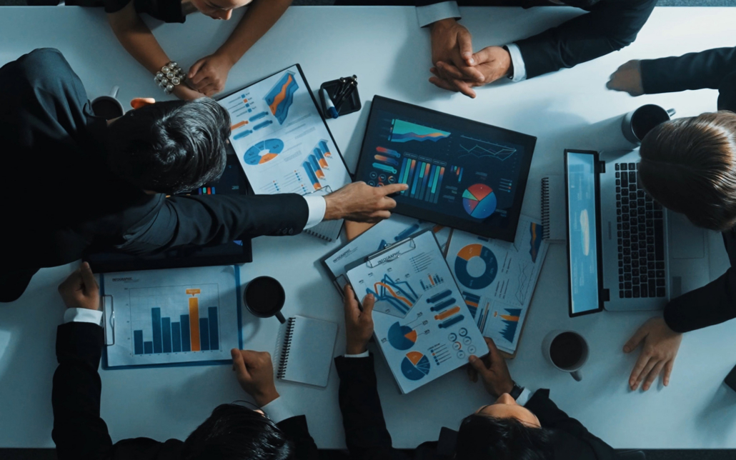 Top Down View Of Financial Meeting