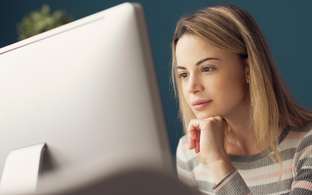 Young Woman Working With A Computer