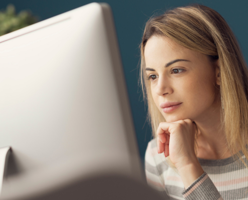 Young Woman Working With A Computer